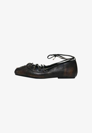 Black leather flat shoe with a rounded toe, lace-up detail, and a low heel. Textured finish with subtle color variations.