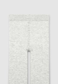 Leggings grigi con texture, dotati di un bordo superiore liscio, caratterizzati da un design senza cuciture e da una piccola apertura nell'area inguinale.