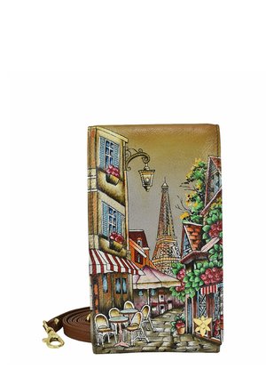 Brown leather wallet featuring a Parisian street scene with cafes, a lantern, and the Eiffel Tower. Vibrant colors and detailed design.