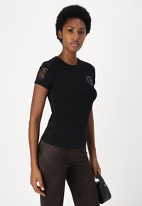 Guess T-shirt con stampa - jet black