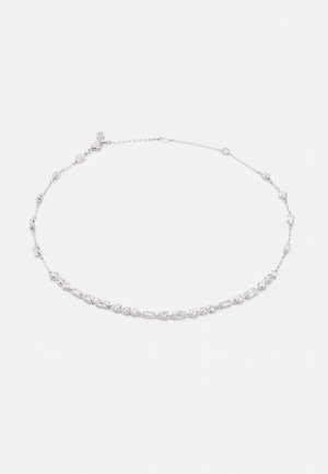 Silver-toned necklace featuring an alternating pattern of round and rectangular clear crystals, with a delicate chain and adjustable clasp.