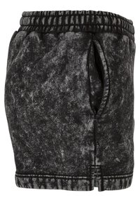 Black acid-wash shorts with an elastic waistband, side pockets, and a soft, textured fabric; short length with exposed stitching details.