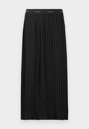 Svart midiskjørt med folder og elastisk midjebånd som har et gjentagende Calvin Klein-logo i hvitt.