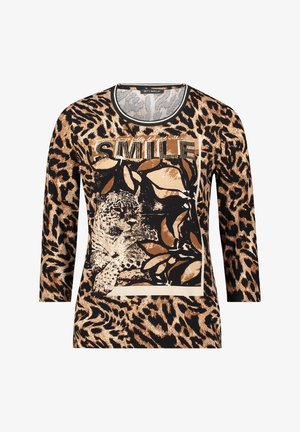 Langärmliges Oberteil mit einem Leopardenprint-Design in Beige und Schwarz, das eine zentrale "SMILE"-Grafik aus Strasssteinen aufweist. Weicher Stoff, Rundhalsausschnitt.
