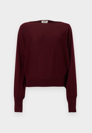 Bourgognefarvet langærmet sweater lavet af blødt materiale, med bred hals, ribstrikkede manchetter og en kortet kant. Sømløs design, ensfarvet tekstur.