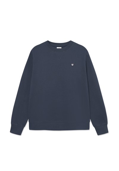 Sweatshirt bleu marine avec un col rond côtelé, des manches longues et un petit logo sur la poitrine. Matière en mélange de coton doux, coupe décontractée.