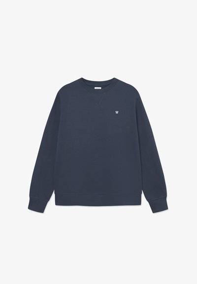 Sweatshirt bleu marine avec un col rond côtelé, des manches longues et un petit logo sur la poitrine. Matière en mélange de coton doux, coupe décontractée.