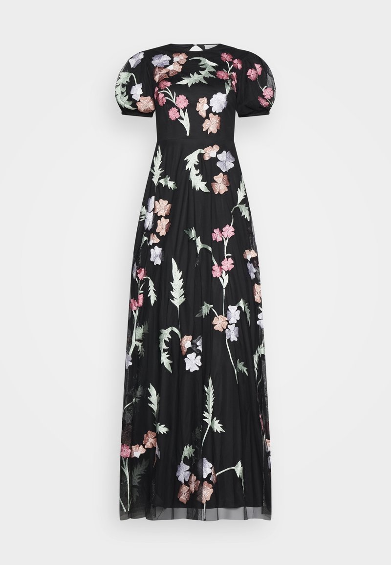 Robe noire longue jusqu'au sol avec manches bouffantes, ornée de broderies florales multicolores en rose, violet et vert. Tissu doux et fluide.