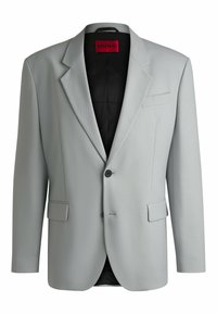 Light gray blazer with notch lapels, two front pockets, single button closure, and black lining. Label on collar reads "HUGO."