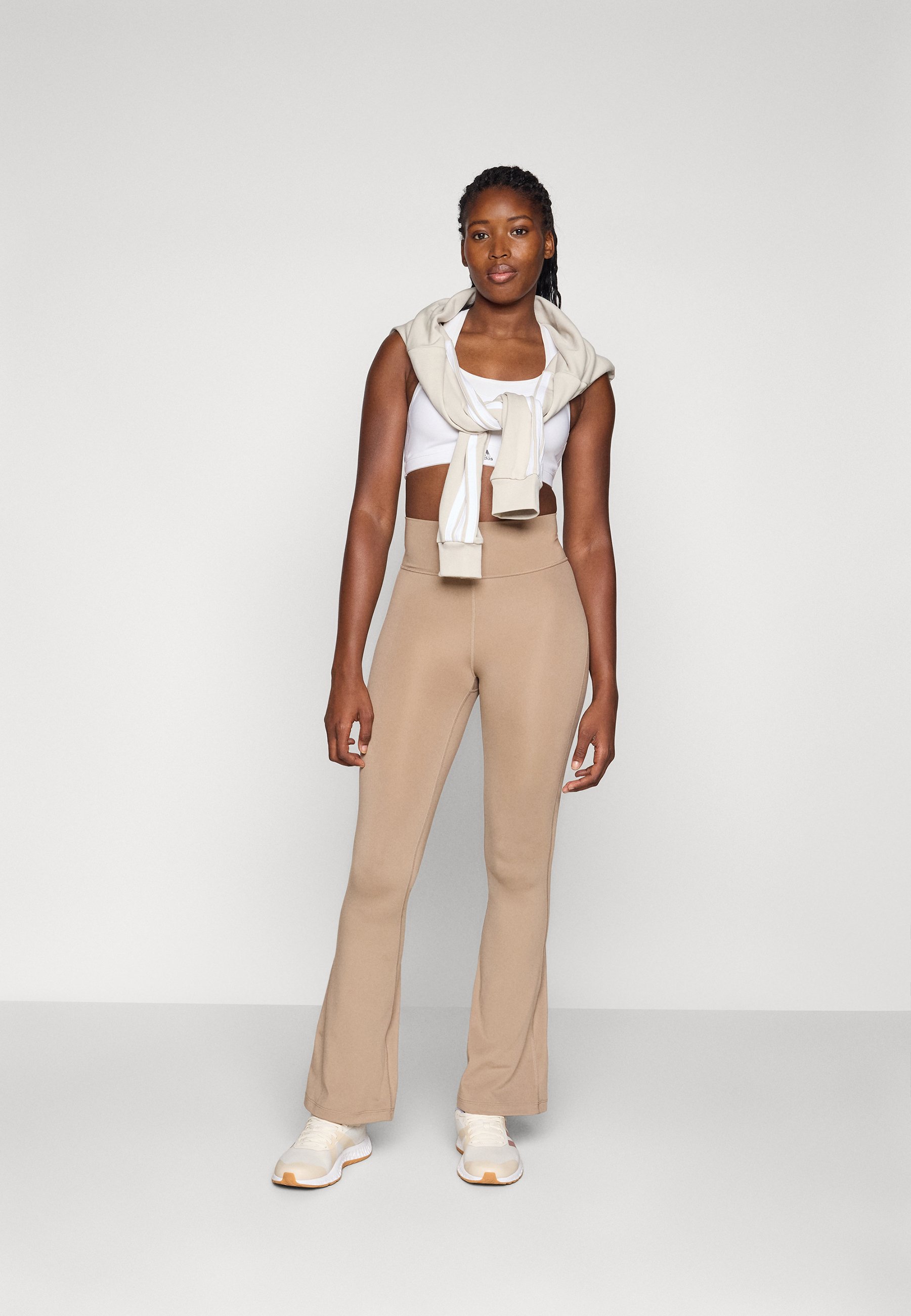 adidas Performance ALLME ESS FLARE - Leggings - chalky brown/brown