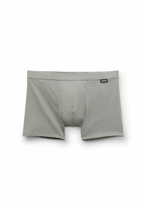 Boxers gris foncé en coton lisse. Taille mi-haute avec bande élastique. Design frontal simple sans motifs ni accents visibles.