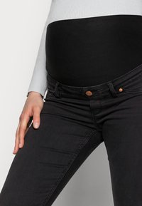 Lindex Maternity TOVA SOFT  - Calças de ganga de corte skinny - black