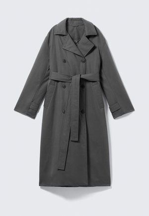 Gray trench coat with a double-breasted front, belted waist, wide notch collar, and side pockets. Smooth fabric with a matte finish.