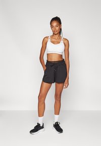 Puma PAMELA REIF SHORTS - Sporta šorti - black