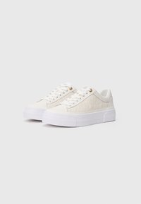 White leather sneakers with a textured upper, rounded toe, and a thick white rubber sole. Features gold eyelets and white laces.