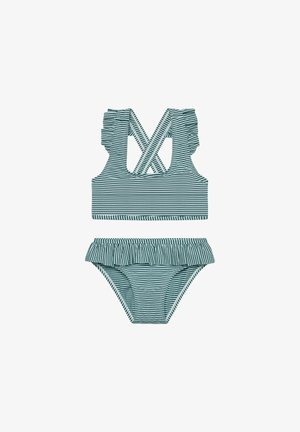 Maillot de bain deux pièces rayé en bleu sarcelle et blanc. Le haut présente des bretelles à volants avec un dos croisé ; le bas a une taille à volants.