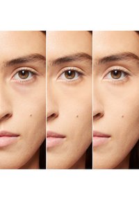 Tre närbilder av ett ansikte som visar variationer i hudton och struktur, med bruna ögon och synliga födelsemärken på kinderna.