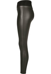Leggings noirs mats avec une taille haute. Design ajusté avec une texture lisse, idéal pour le sport ou une utilisation casual.