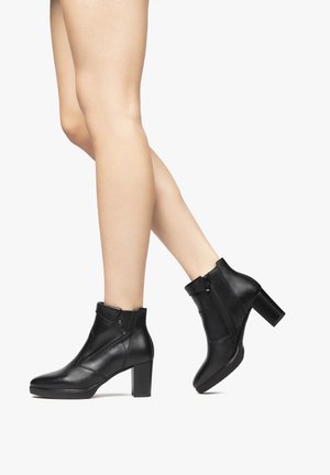 Platform ankle boots - nero