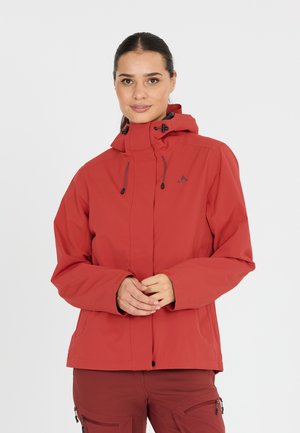 Red waterproof jacket with a hood, adjustable drawstrings, and front pockets. Smooth texture, designed for outdoor activities, with a modern fit.