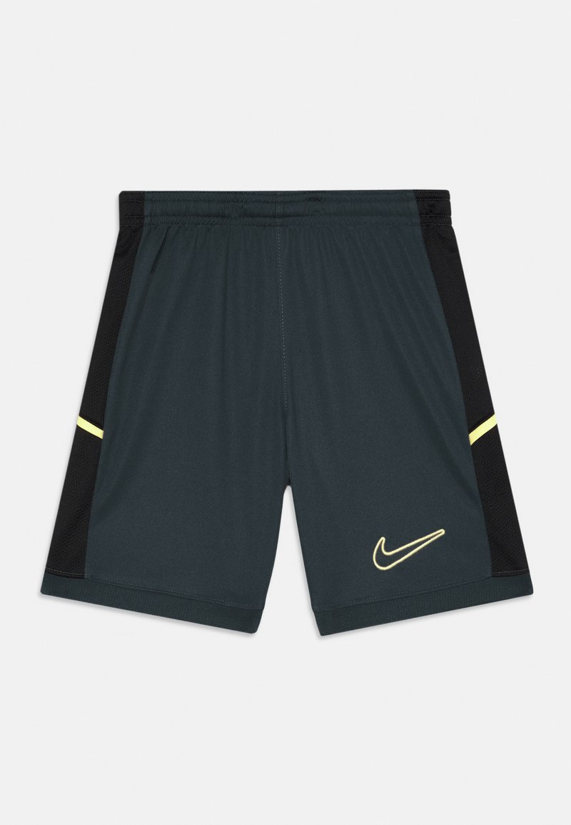 Nike sportiniai šortai tamsiai pilkos spalvos su juodomis tinklinėmis šoninėmis dalimis. Yra geltonas akcentinis juostelė ir logotipas. Lengvas, kvėpuojantis audinys.