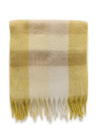 Blød uld plaid tørklæde i gule, beige og creme nuancer med frynser i enderne, foldet pænt på en hvid baggrund.