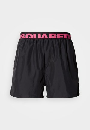 Pantaloni scurți de înot negri cu talie elastică roz, inscripționată cu textul "DSQUARED2". Textură ușoară și netedă. Design casual, potrivit pentru activități acvatice.