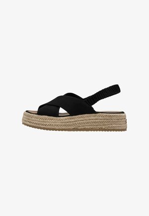Sorte espadrillesandaler med krydset design, elastisk bagrem og sål med juteindpakning. Glat tekstur med gummiydersål.