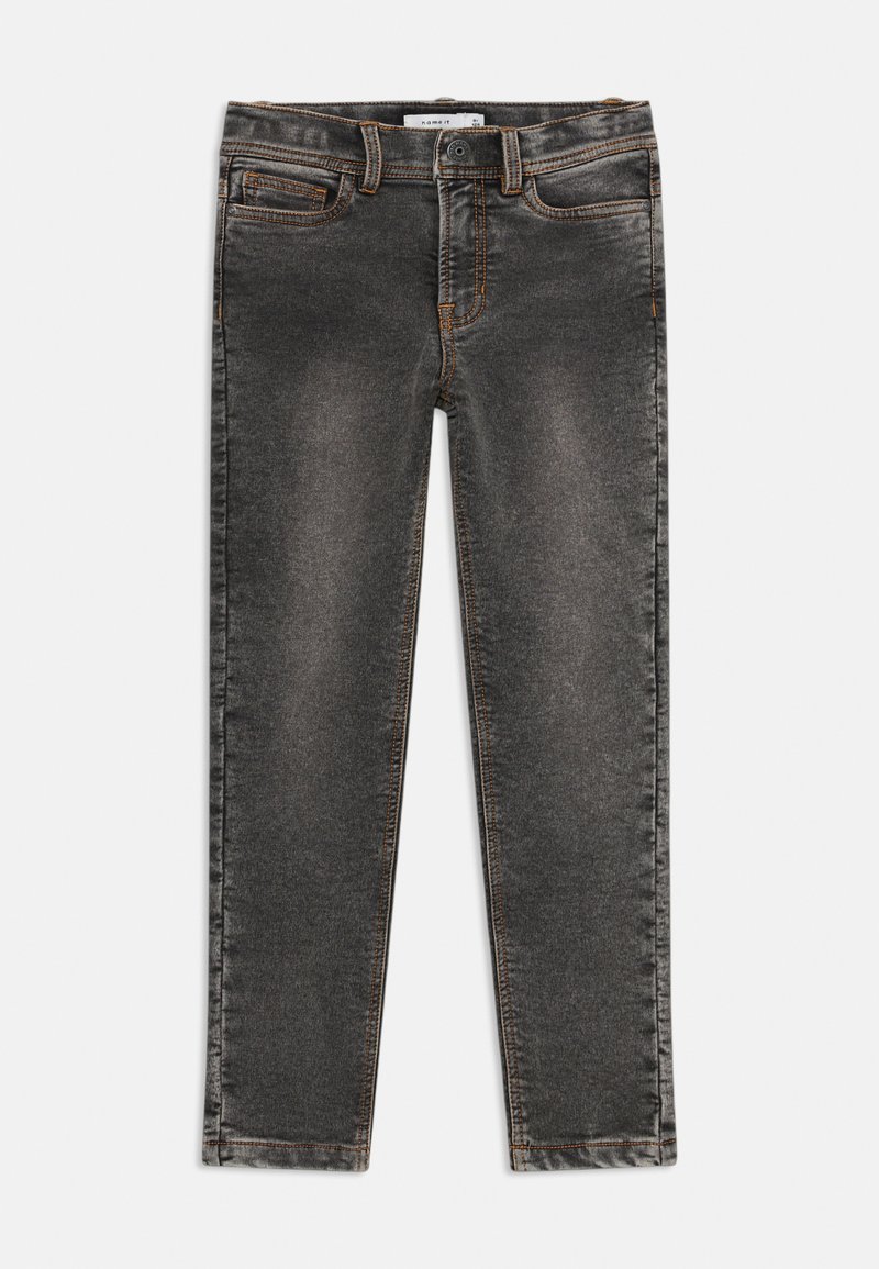 Mørkegrå denimjeans med slim fit, som har fem lommer og oransje søm. Tøyet har en lett falmet tekstur.
