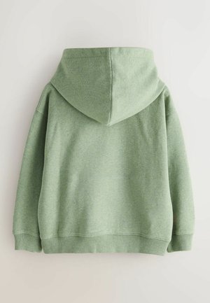 Zelená mikina s kapucňou vyrobená z mäkkej tkaniny, s voľným strihom, rebrovanými manžetami a klokanou kapsou na prednej strane.