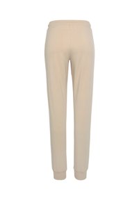 Beige, tapered Jogginghosen mit elastischem Bund und eingefassten Säumen, aus weichem, dehnbarem Material für maximalen Komfort.