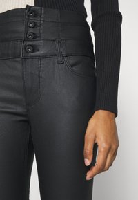 ONLY Petite ONLCORAL  - Παντελόνι - black