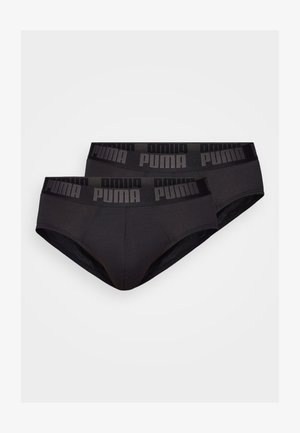 Schwarze Baumwollslips mit einem dunklen elastischen Bund, der mit dem "PUMA"-Logo verziert ist. Das Design ist glatt mit einer enganliegenden, tief sitzenden Form.