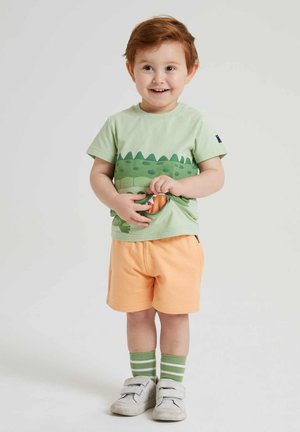 Polarn O. Pyret Jogginghose - salmon buff