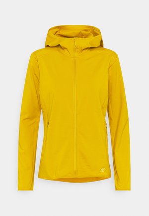 Veste jaune à capuche avec fermeture éclair frontale et deux poches latérales, présentée sur un fond blanc uni.