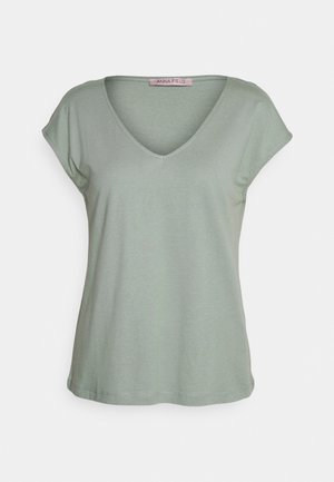 Soft green short-sleeve V-neck T-shirt with rolled sleeves and a straight hem, labeled "Anna Field" inside the collar.