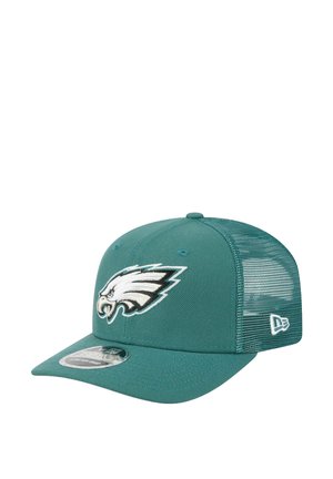 Türaubergelber Baseballcap mit grünem Netzrücken, mit einem weißen gestickten Adlerlogo auf der Vorderseite und einem flachen Schirm.