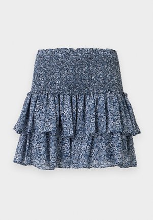 Mini-jupe bleue à fleurs avec taille smockée et ourlet à volants superposés, tissu léger.