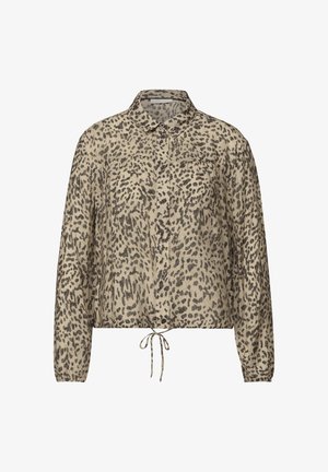 Krótka bluzka z beżowego materiału z czarnym wzorem w panterkę, z zapinaniem na guziki z przodu i sznurkiem w talii. Długie, bufiaste rękawy.