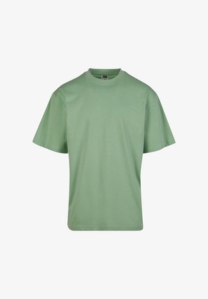 Zöld, rövid ujjú póló, puha pamutból készült, laza fazonnal és kerek nyakkal. Egyszerű design, minták vagy díszítések nélkül.