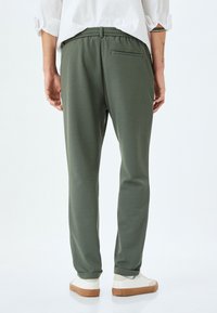 Koton SLIM FIT  - Chinos - green