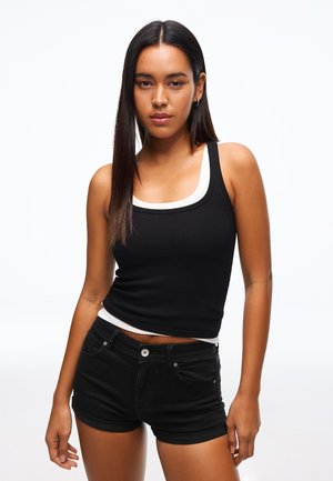 ROLL-UP - Jeansshort - black