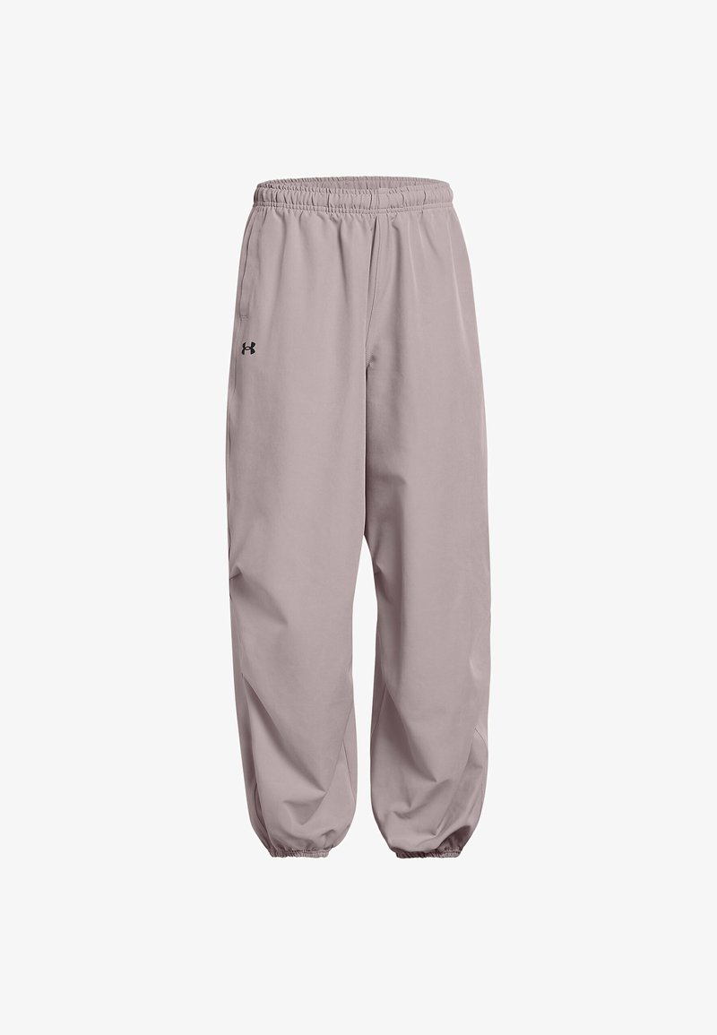Pantalones deportivos de color gris claro con una cinturilla elástica, corte holgado y un pequeño logo negro en el lado izquierdo. Hechos de una tela suave.