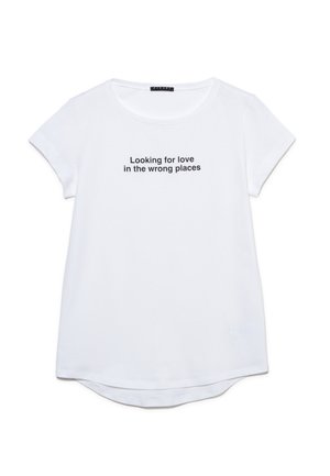 T-shirt en coton blanc avec un col rond et des manches courtes. Le texte à l'avant indique "À la recherche de l'amour aux mauvaises adresses" en noir.