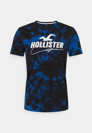 Zwart-blauw tie-dye T-shirt met korte mouwen met wit Hollister California-logo en meeuwgrafiek op de voorkant.