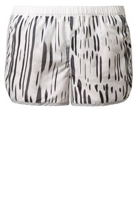 White athletic shorts featuring a black abstract stripe pattern. Elastic waistband, lightweight fabric, and side slits for ease of movement.