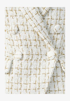 White textured fabric with a golden thread pattern, featuring a double-breasted design and round buttons.