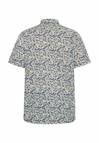 Camisa de manga corta en navy con un estampado floral en crema. Presenta un collar clásico, dobladillo recto y una textura de tela ligera.