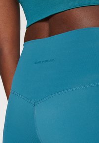 ONLY Play ONPJAM-3-SANA - Leggings - dragonfly