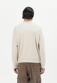 Jack & Jones PREMIUM JPRBLACHAD BRANDING CREW NECK - Melegítőfelső - beige